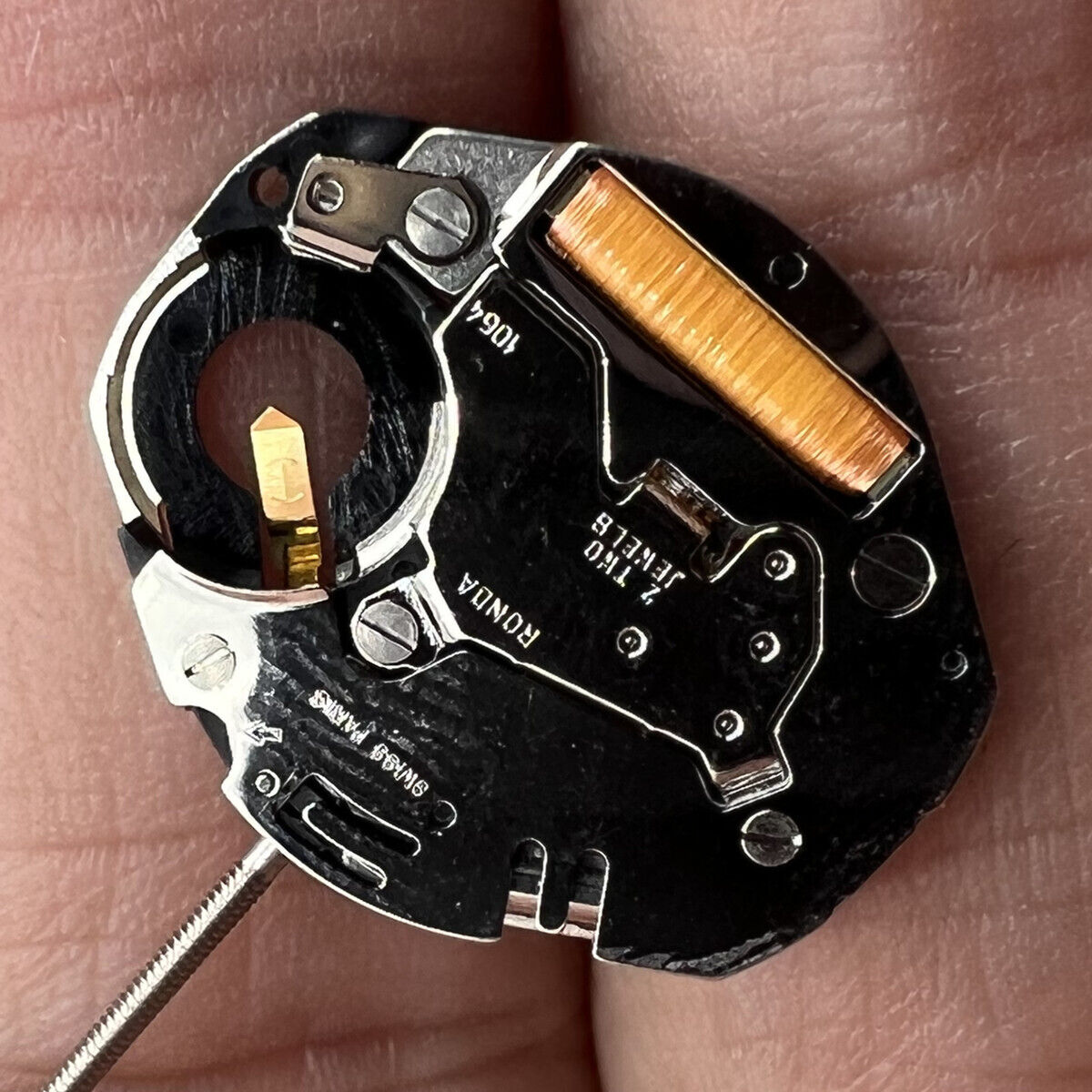 Ronda 1064 Swiss quartz watch movement with high canon pinion for precise timekeeping.