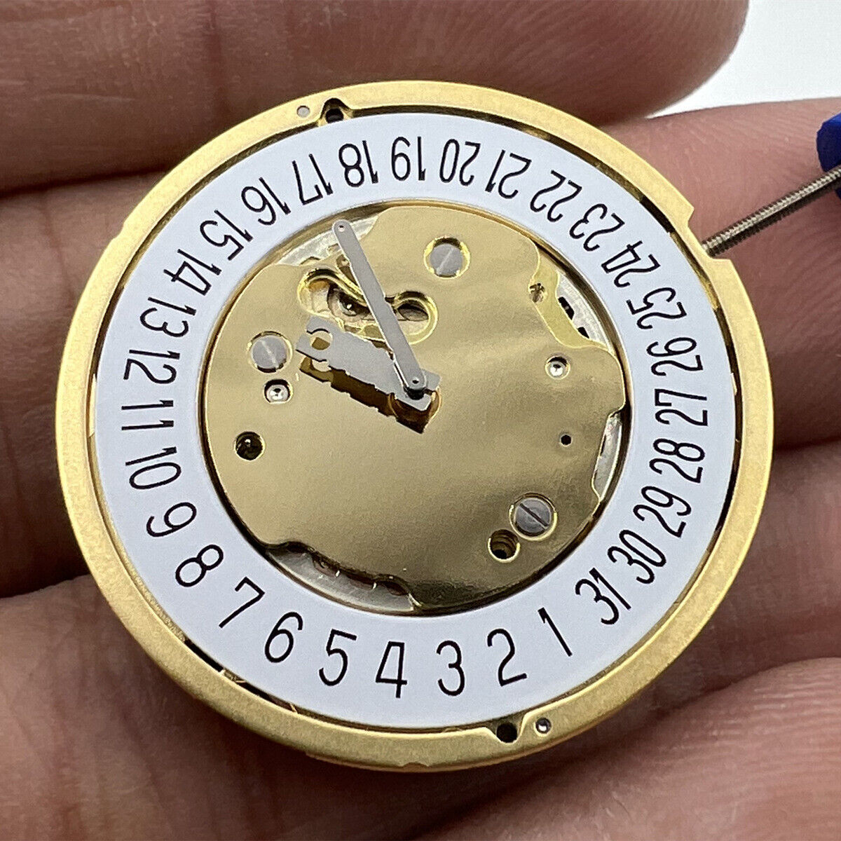 Ronda 5021.D Swiss quartz watch movement with date display at 6 o'clock, reliable precision, Ronda brand.