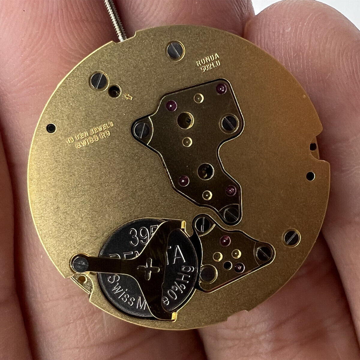 Ronda 5021.D Swiss quartz watch movement with date display at 6 o'clock, reliable precision, Ronda brand.