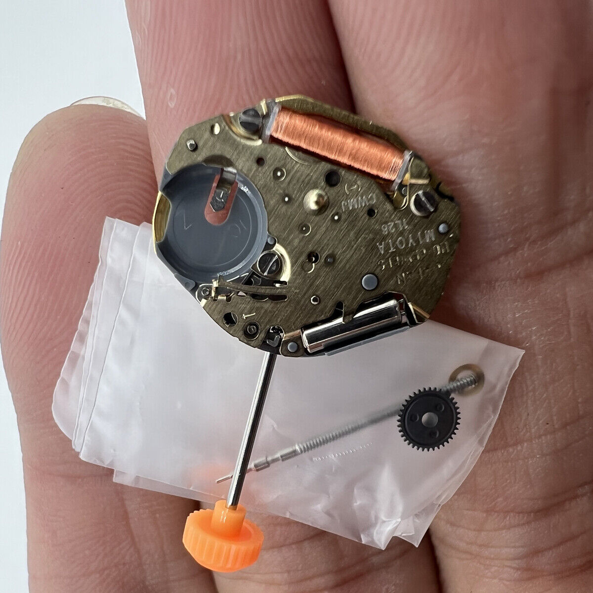 Miyota 1L26 Japan Quartz Movement close-up showing precise watch mechanism components