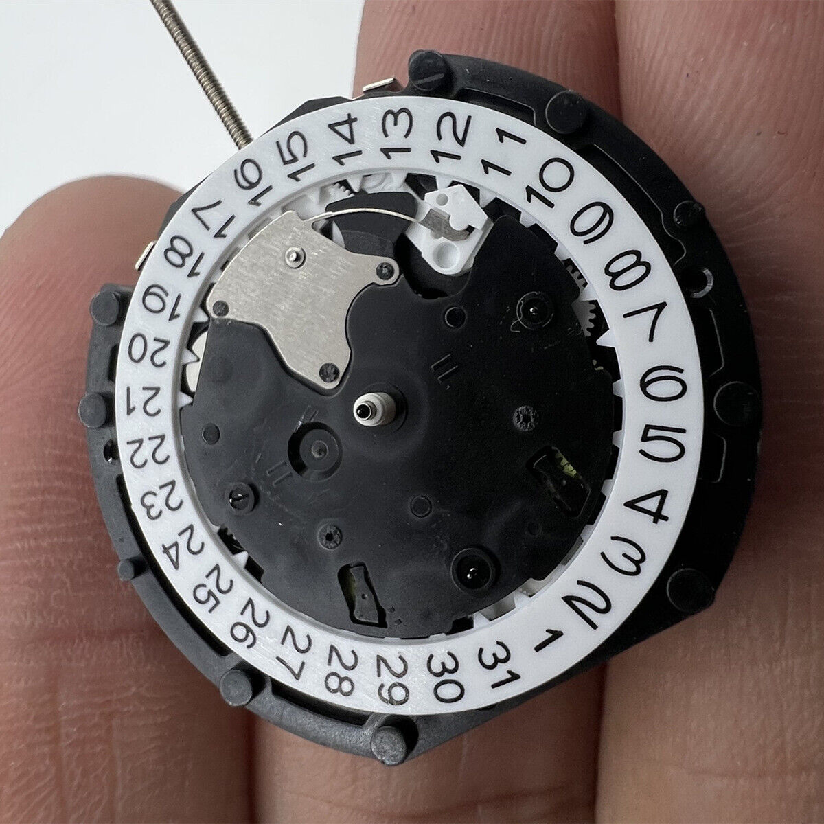 Sunon PE90 quartz watch movement with 3 hands and small seconds at 6, 9, and 12 o?clock positions