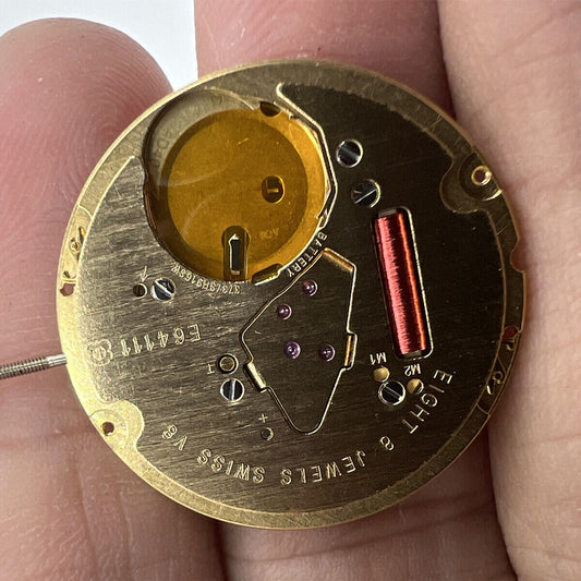 ETA E64.111 Swiss quartz watch movement with date display at 3 o'clock and three hands
