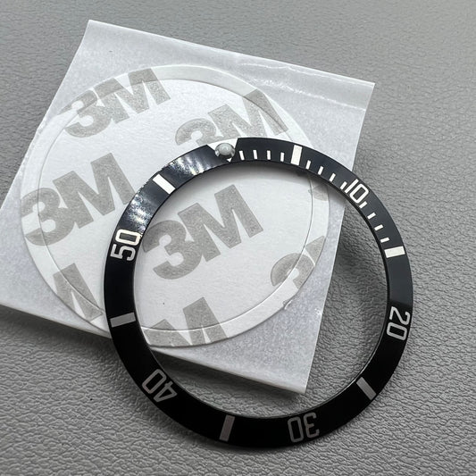 37.5mm green lume aluminum bezel with black base and silver SUB font, ideal for Rolex watch upgrades.