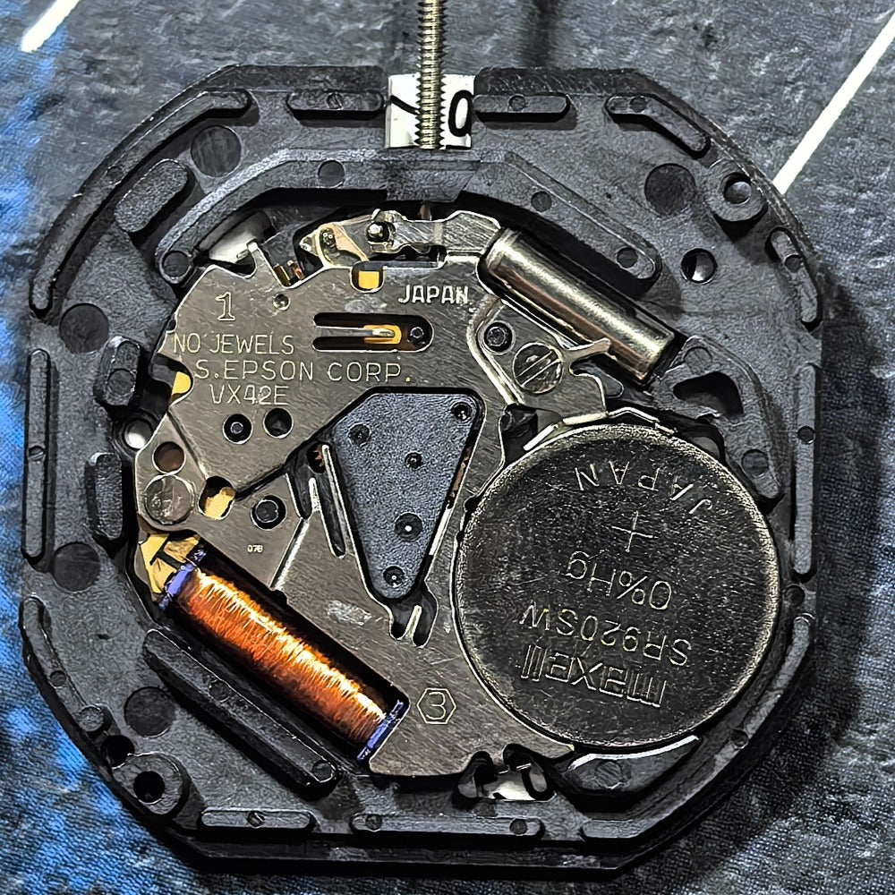 Epson VX42E watch movement with black dial, three hands, single calendar, Japan made Quartz