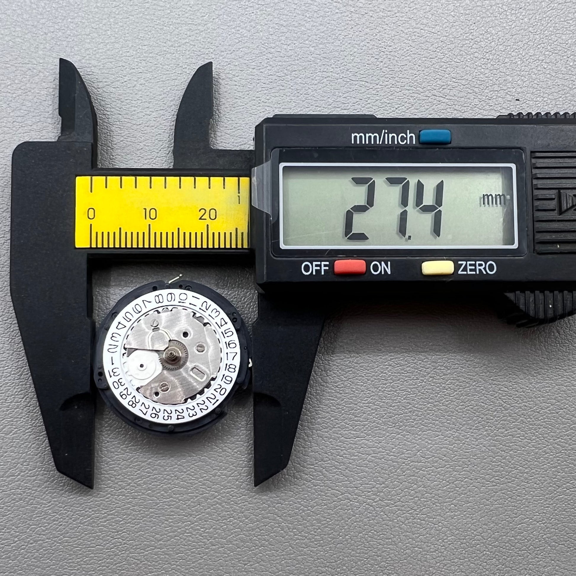 Seiko 5M85A quartz watch movement close-up, original Japan mechanism for precise and durable timekeeping.