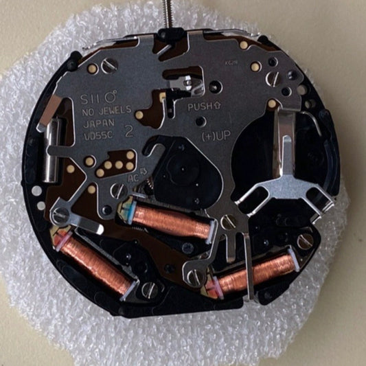 Seiko VD55C quartz movement watch part, precision Japanese-made component for timekeeping repair.