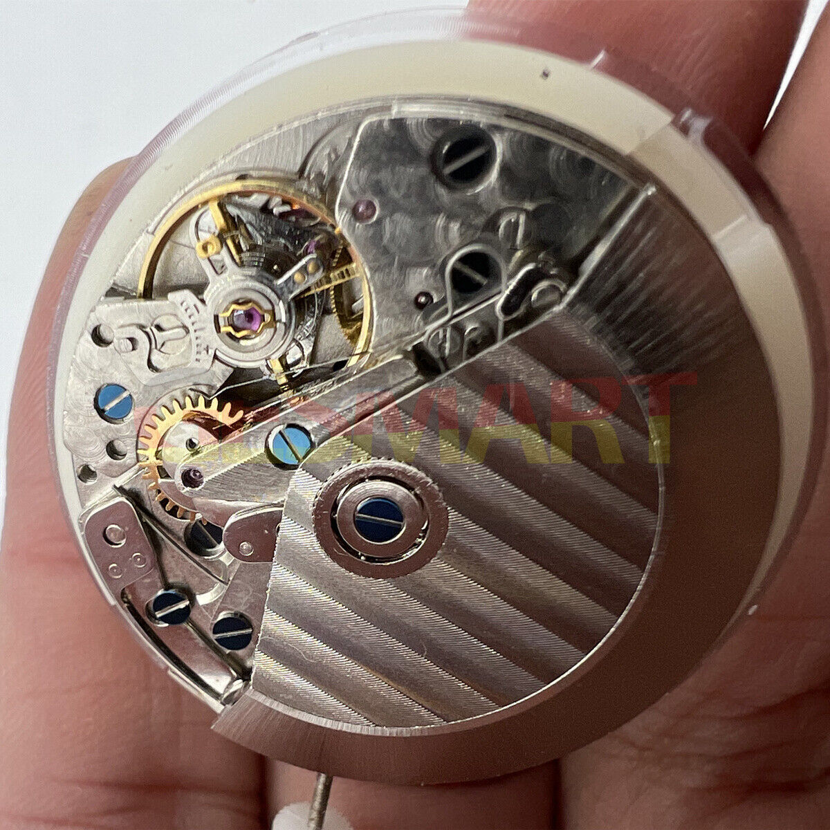 Asian 7750 automatic chronograph watch movement with white calendar, small seconds at 9, precision ETA design.