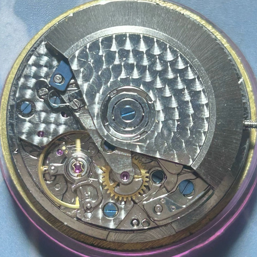 Dandong 7750 mechanical watch accessory with double seconds, small second hands at 3 & 9 o'clock positions for precision timekeeping.