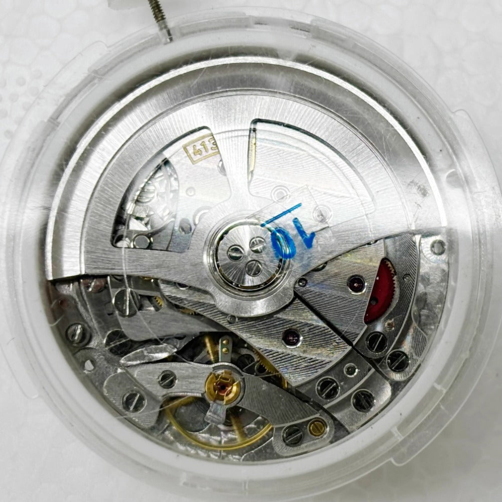 China Made Shanghai 4131 watch dial with automatic mechanical movement and small seconds at 3, 6, and 9 o'clock positions.