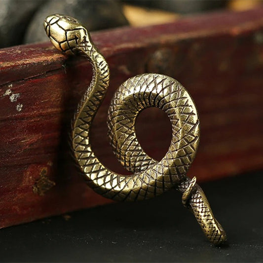 Solid copper snake trinket with vintage hand-carved bronze detailing, perfect for unique decor or gifts.