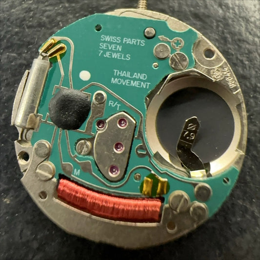 Swiss Made ETA 956.414 quartz watch movement with black dial and date at 6, precision ETA brand.