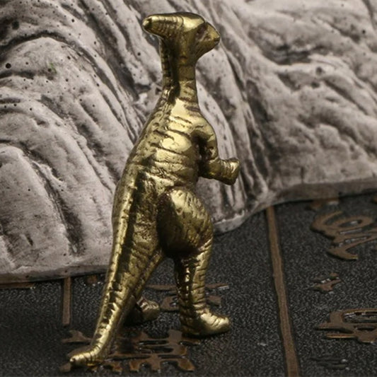 Hand-carved solid copper Coelurosaur figurine showcasing intricate Jurassic Cretaceous details.