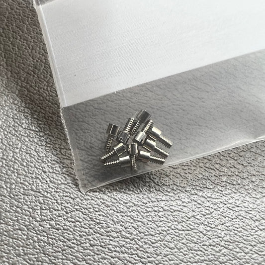 1. Set of 10 watch dial feet screws for China 7120 movement, compatible with various watch repairs.