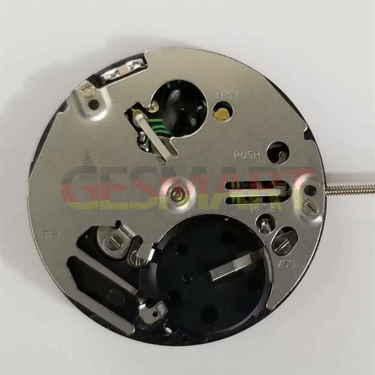 ISA 2320 white dial quartz watch movement with date at 3, Watchmaker repair part for precision timing.