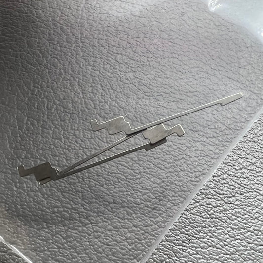 1. Two Seiko-compatible generic click springs for NH35 NH36 watch movements, ideal for repairs.