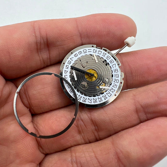 ISA 8171 silver watch movement featuring quartz date display at 4 o'clock, multi-function by Watchmakers.