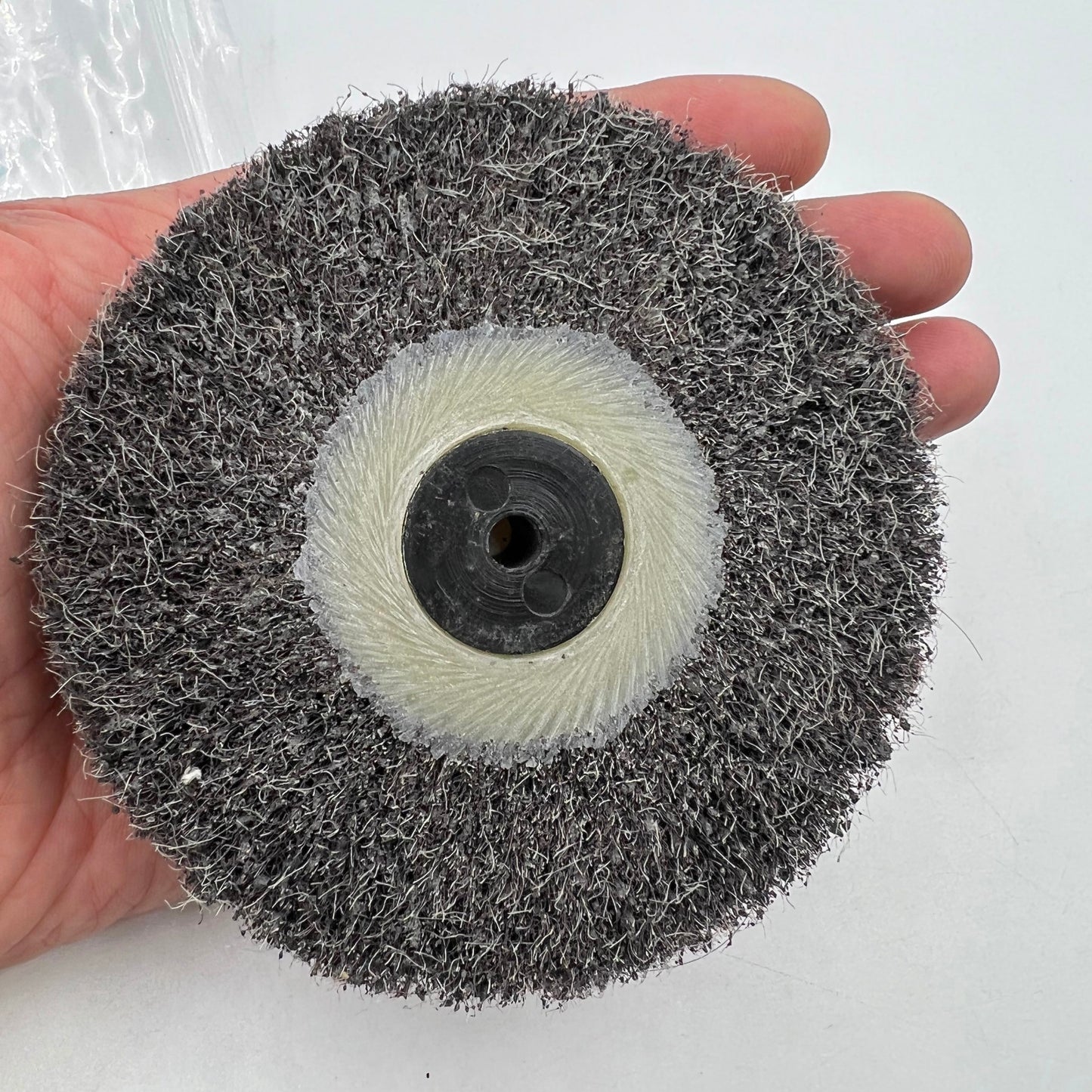 Bergeon 6085-E1 satin metal finishing wheel for precise watch polishing and surface refinement.