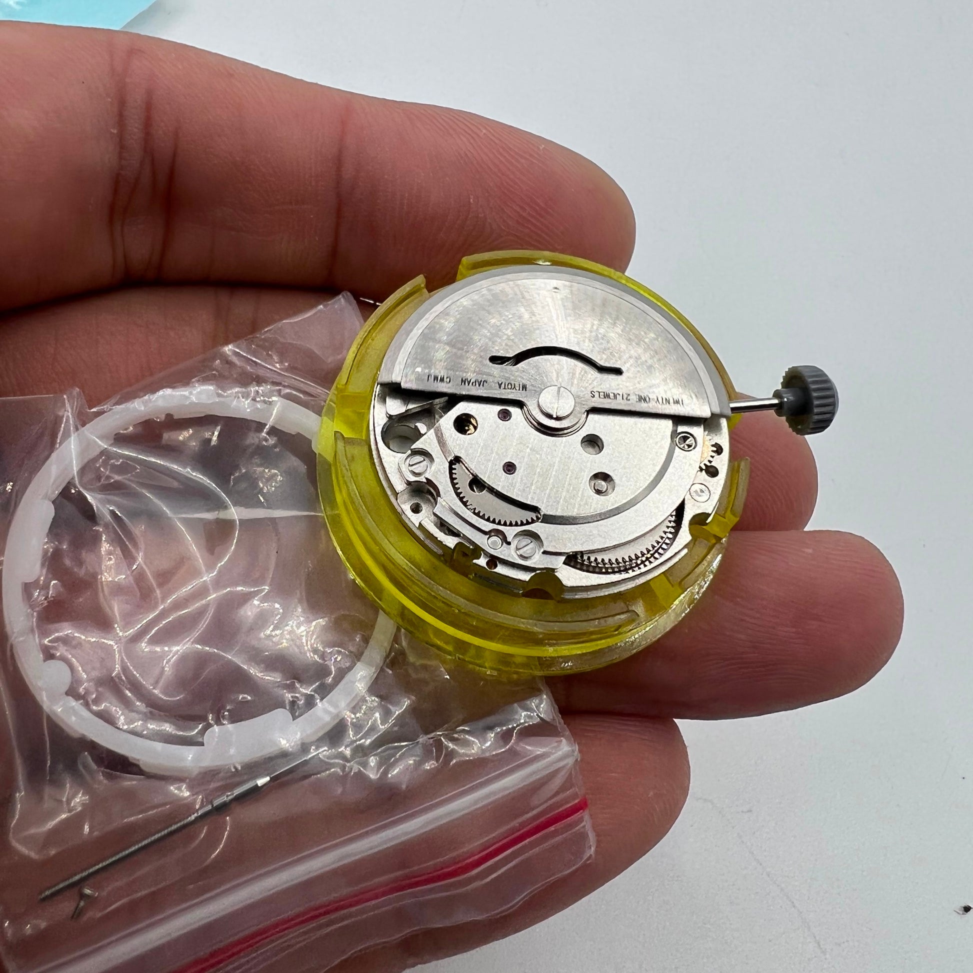 Miyota Citizen 8205 silver plated automatic watch movement showcasing precise mechanical timekeeping.