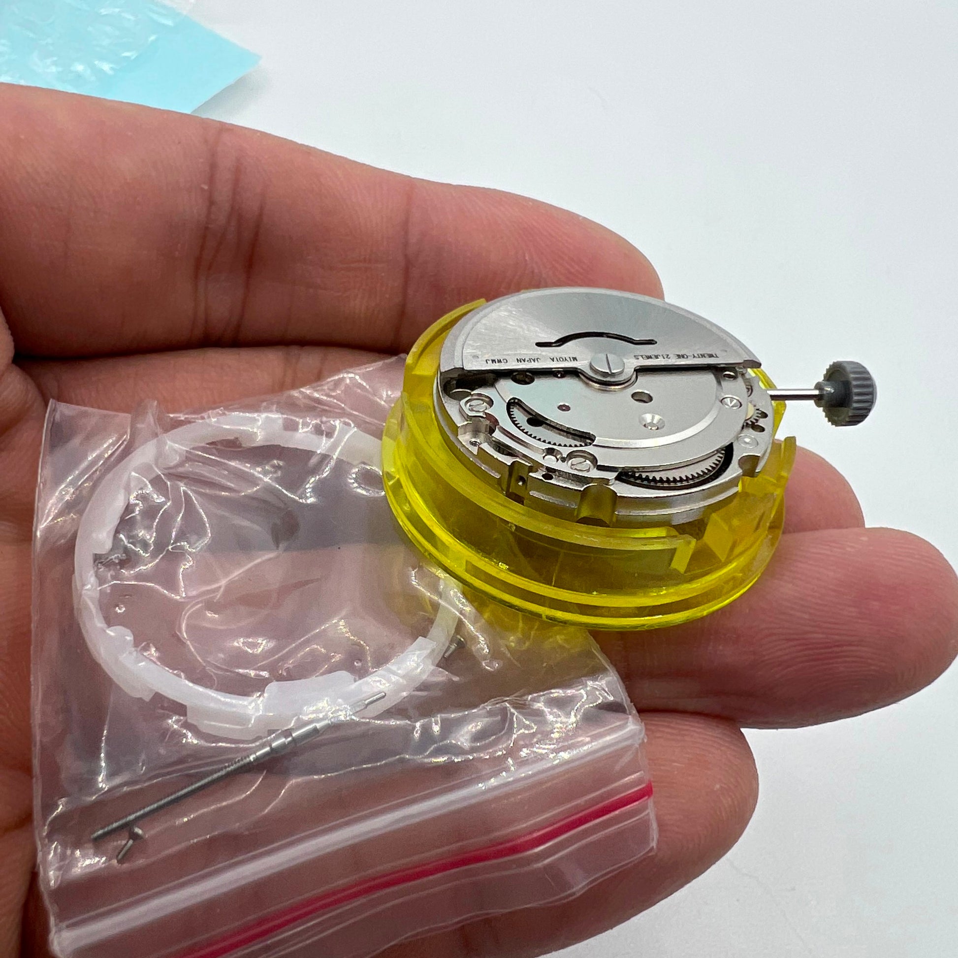 Miyota Citizen 8205 silver plated automatic watch movement, precise mechanical timekeeping component.