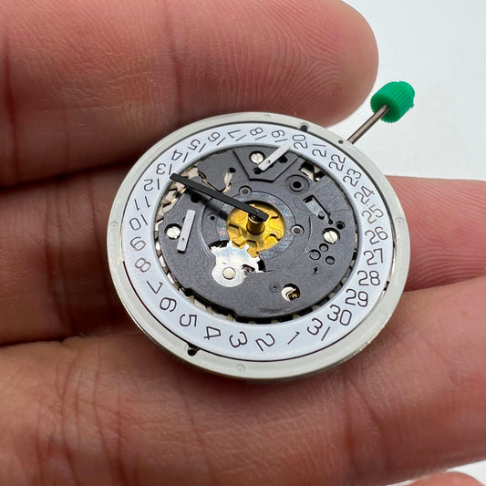 ISA 8172 silver watch with quartz movement and date display at 4 o?clock, featuring precise timekeeping.