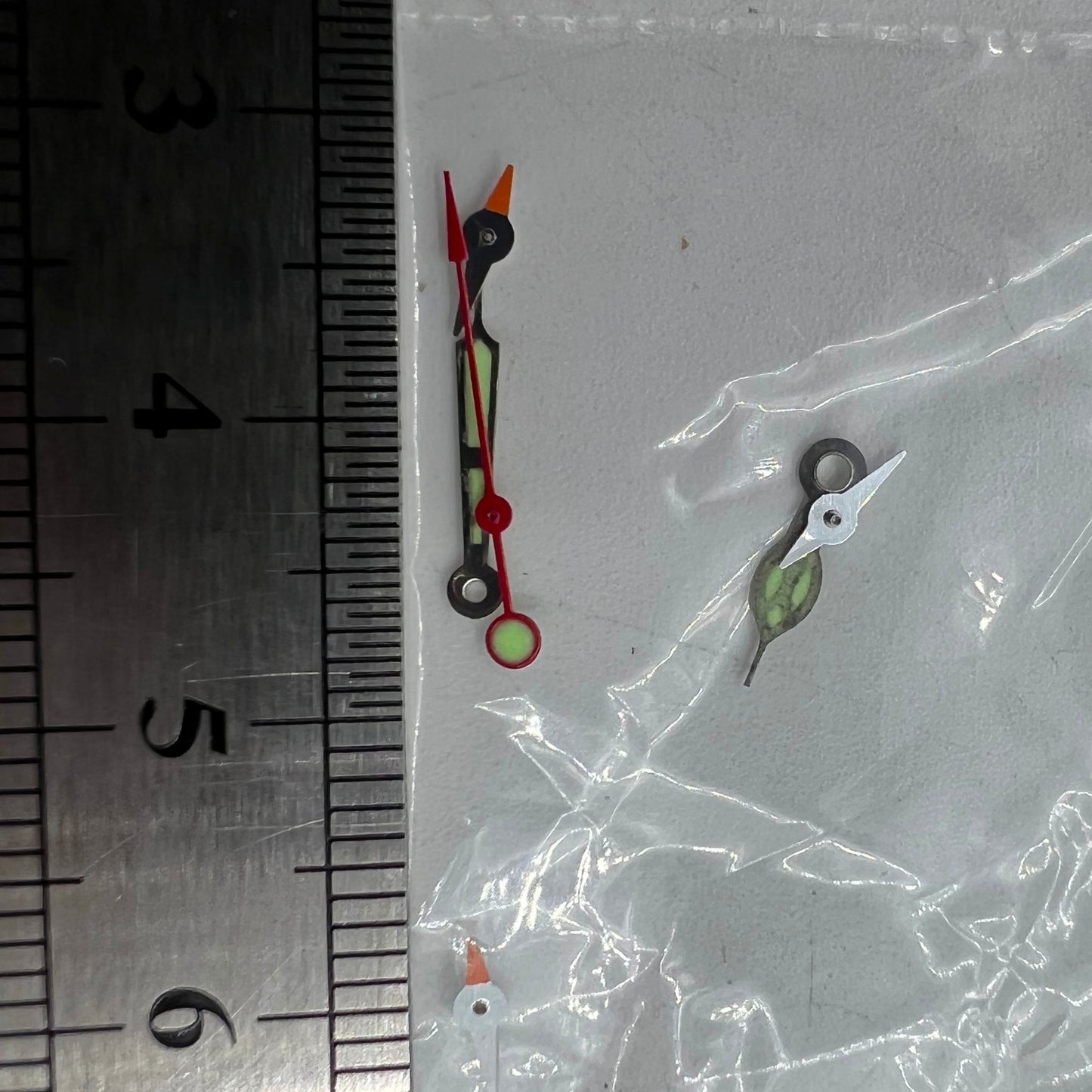 Red second hand with 11.5mm length and green luminous tip for Miyota OS series watches.