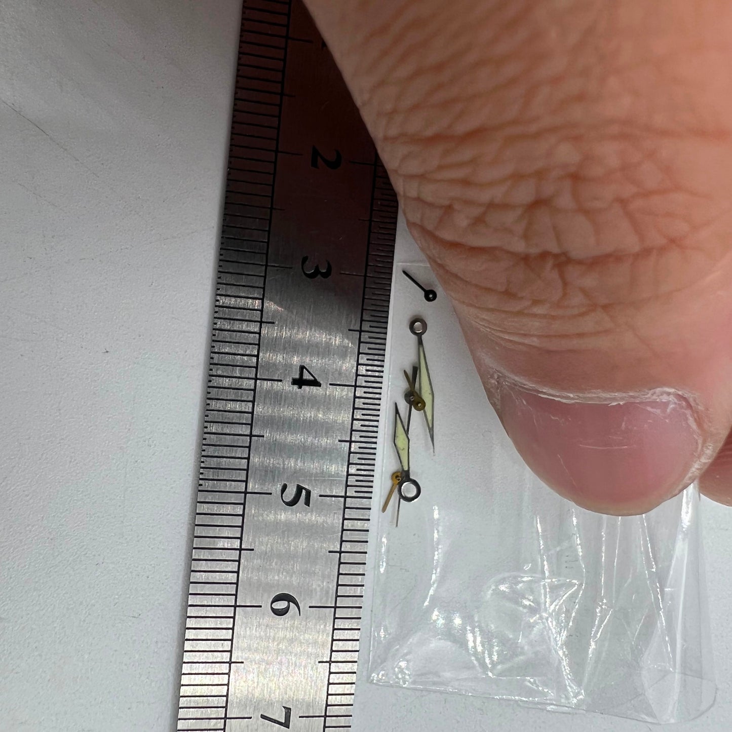 Silver-trimmed green luminous watch hands for Miyota OS60 movement, 15x13x9mm.