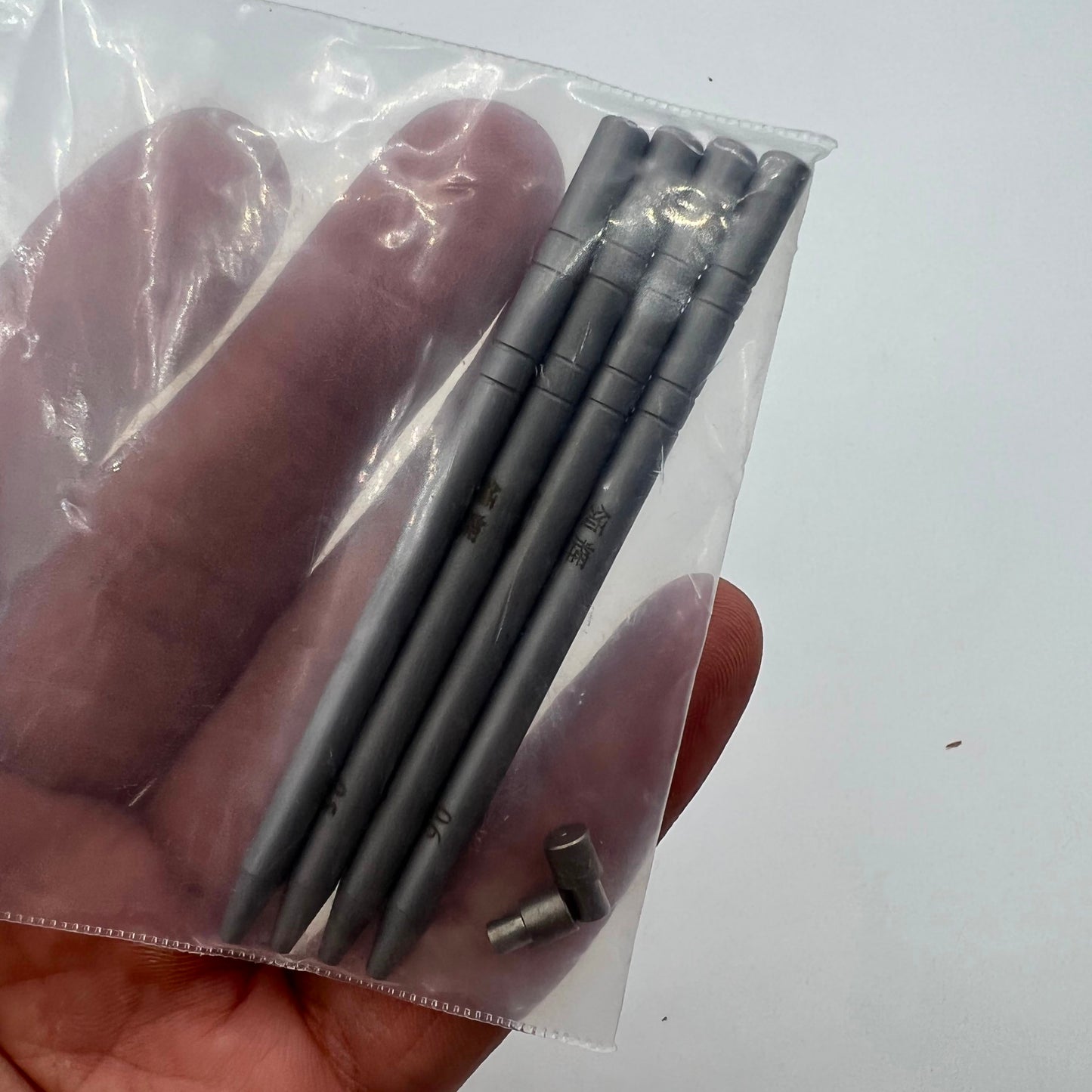 Precision balance staff remover tool by China Made, designed for delicate hairspring installation in watch repair.