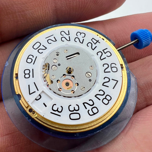 ETA F06.161 watch quartz movement with 3 hands and white dial, perfect for precise timekeeping.