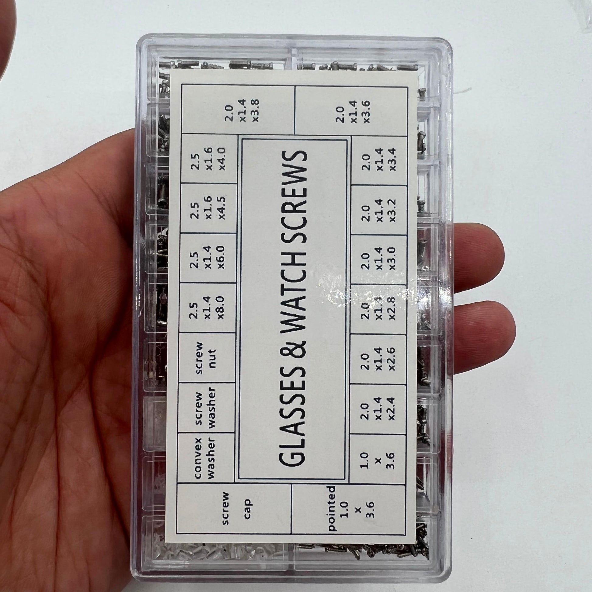 Assorted watch accessory screws and nuts set for micro repairs.