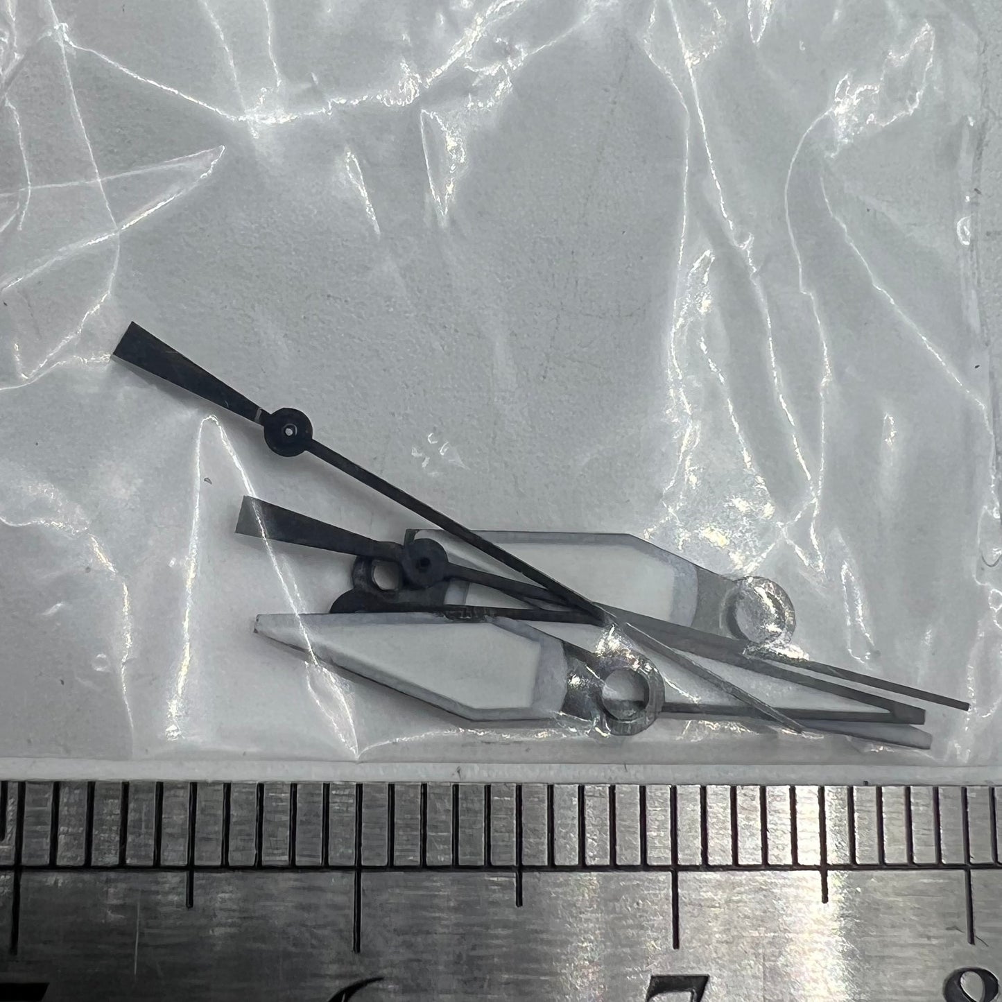 White diamond-shaped orange lume watch hands, designed for ETA2836/2846/2824 movements, bright and stylish.