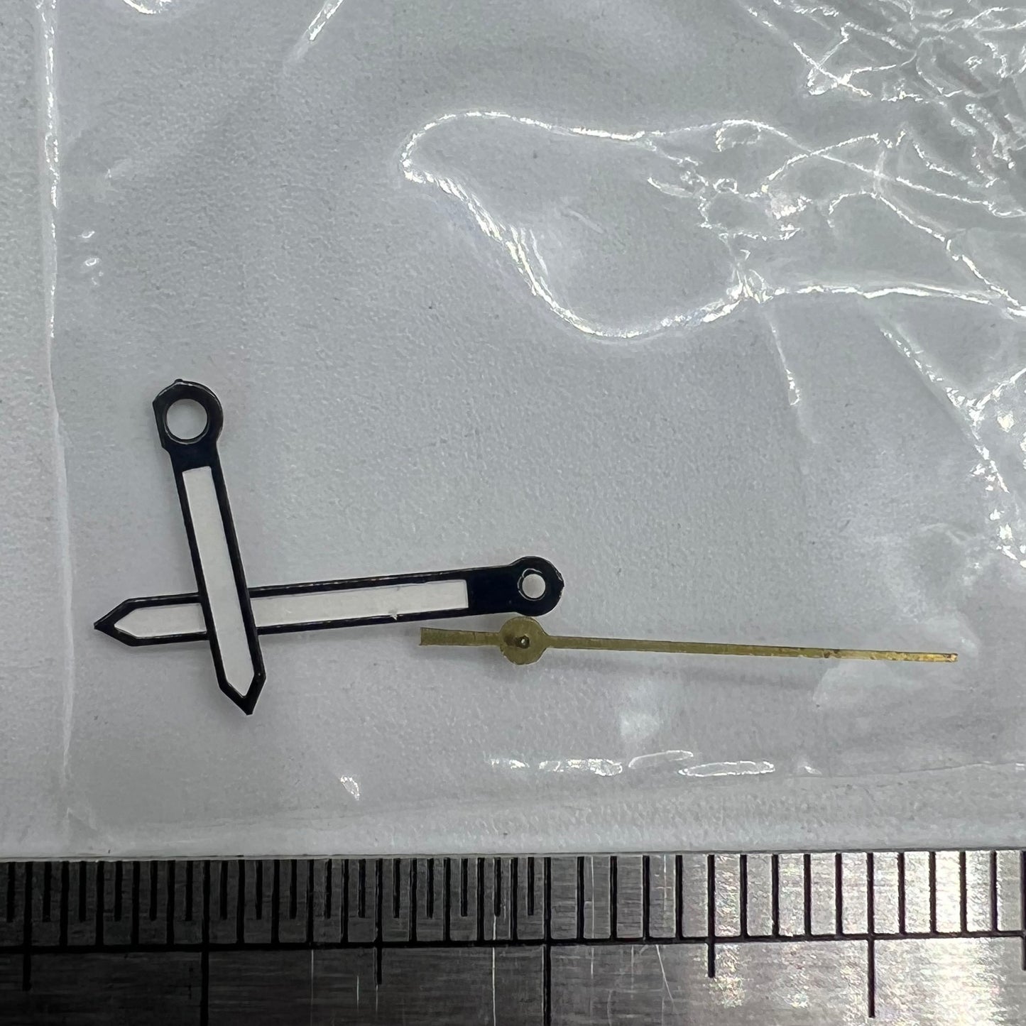 Luminous black trim watch hands by P1-H4-C99 for Miyota 2035 quartz, ensuring precise timekeeping accuracy.