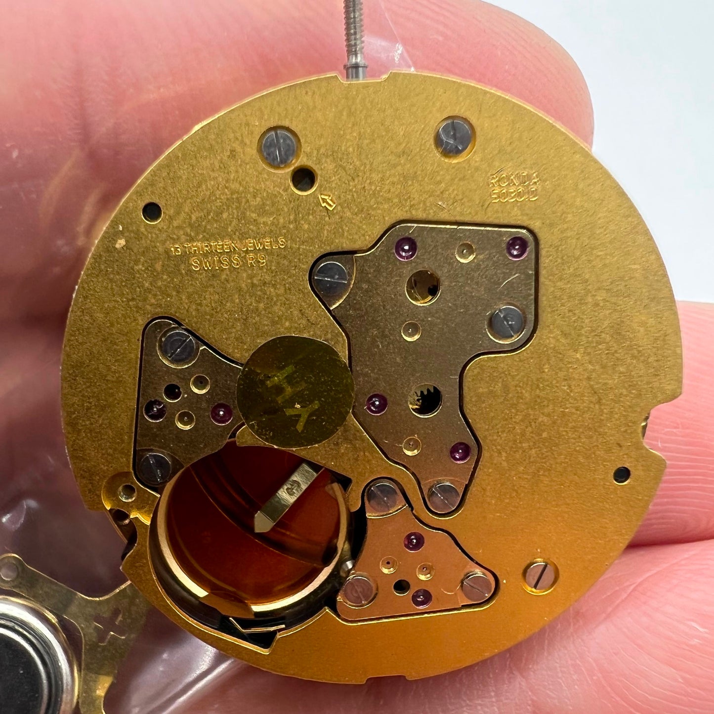 Ronda 5040D Swiss quartz golden watch movement with date, precise and reliable timekeeping by Ronda