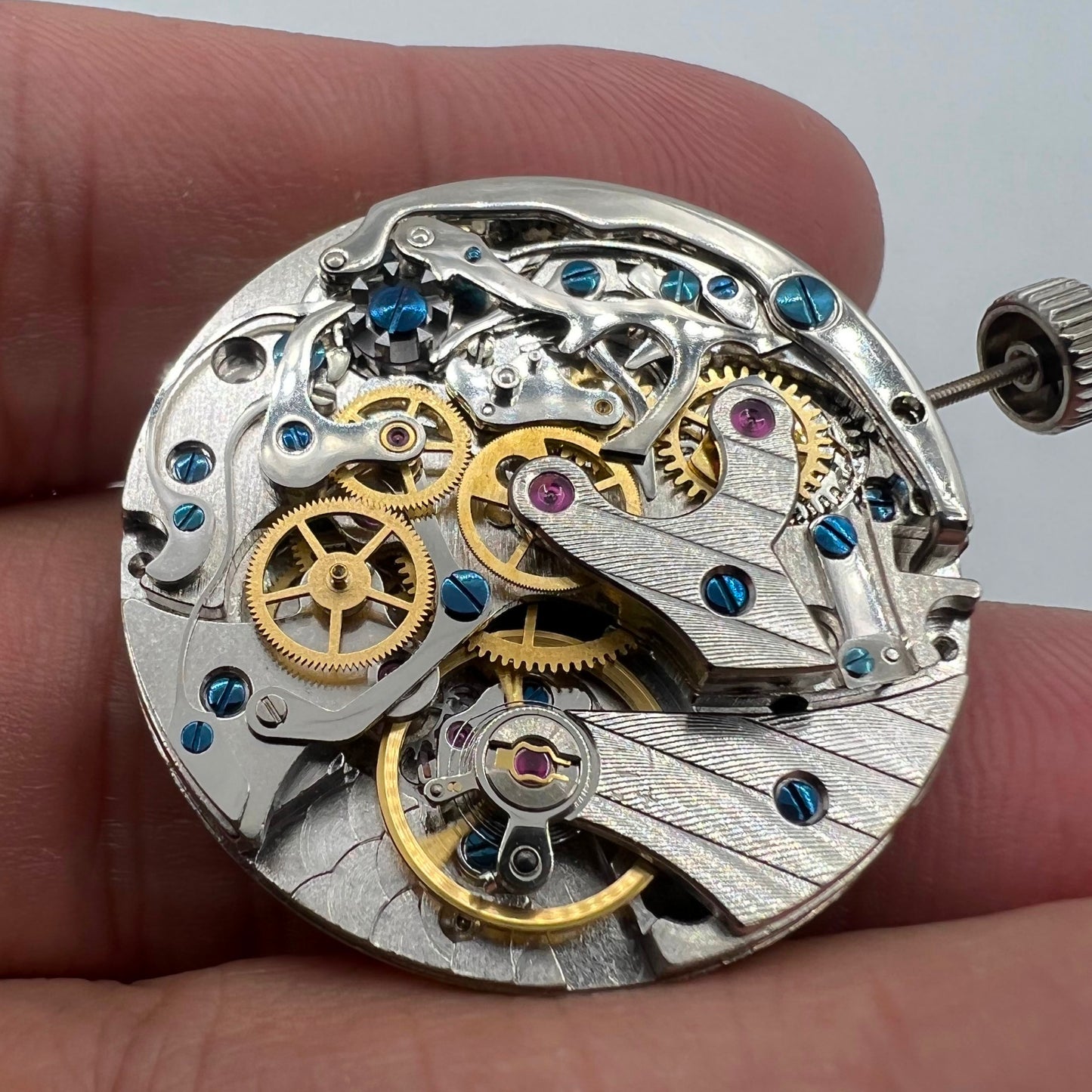 Tianjin Seagull ST1903 watch movement with 24-hour display and precise manual mechanical gears.