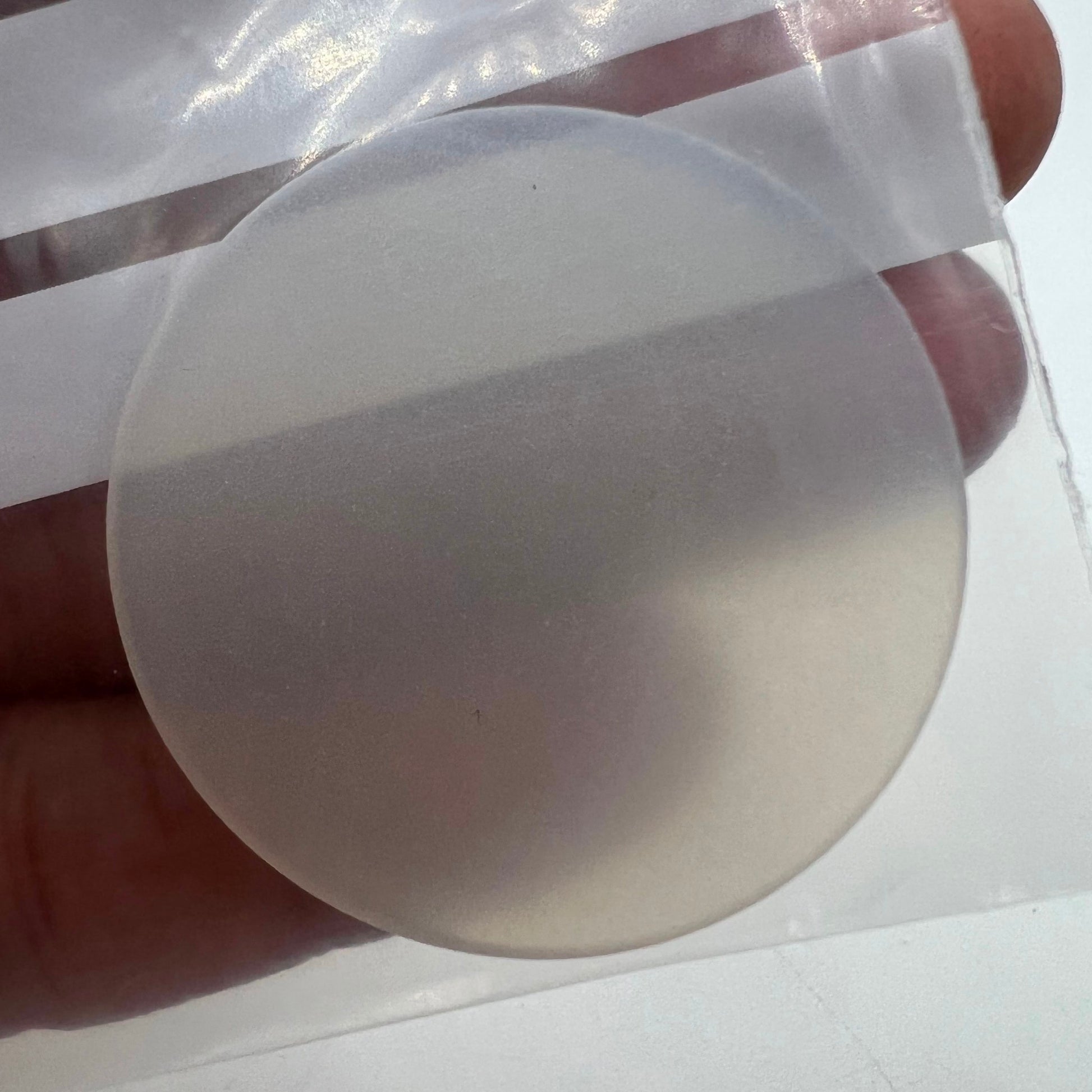Pack of 2 Bergeon 5393-P40 non-slip silicon cushions for secure watch repair and protection.