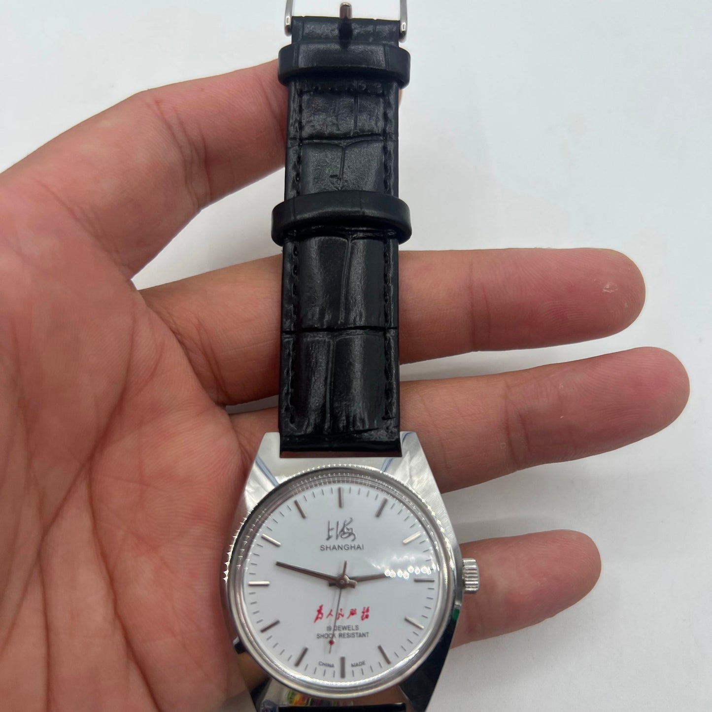 37mm Shanghai Factory 7120 men's manual mechanical watch with shock-resistant feature and classic style.
