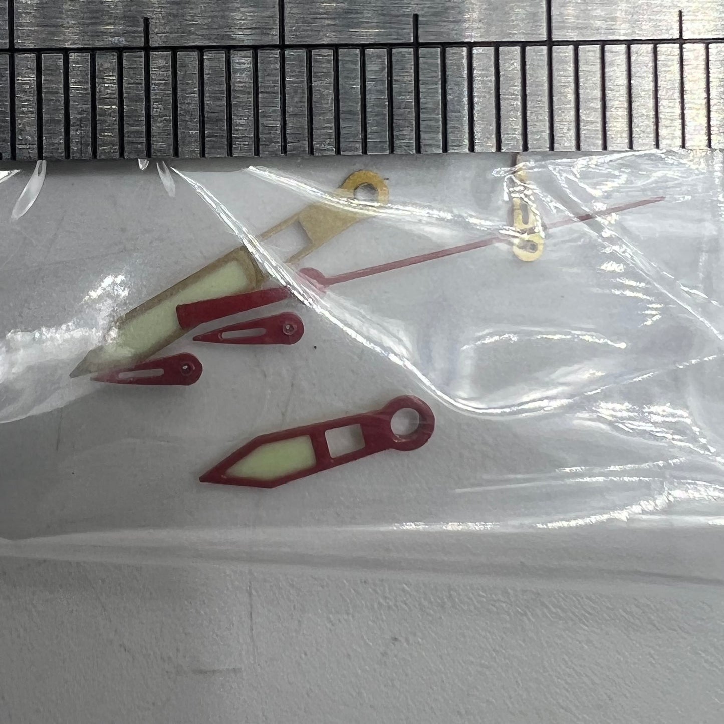 Red-trimmed green luminescent watch hands 19x14x9mm for Miyota OS10 movement.