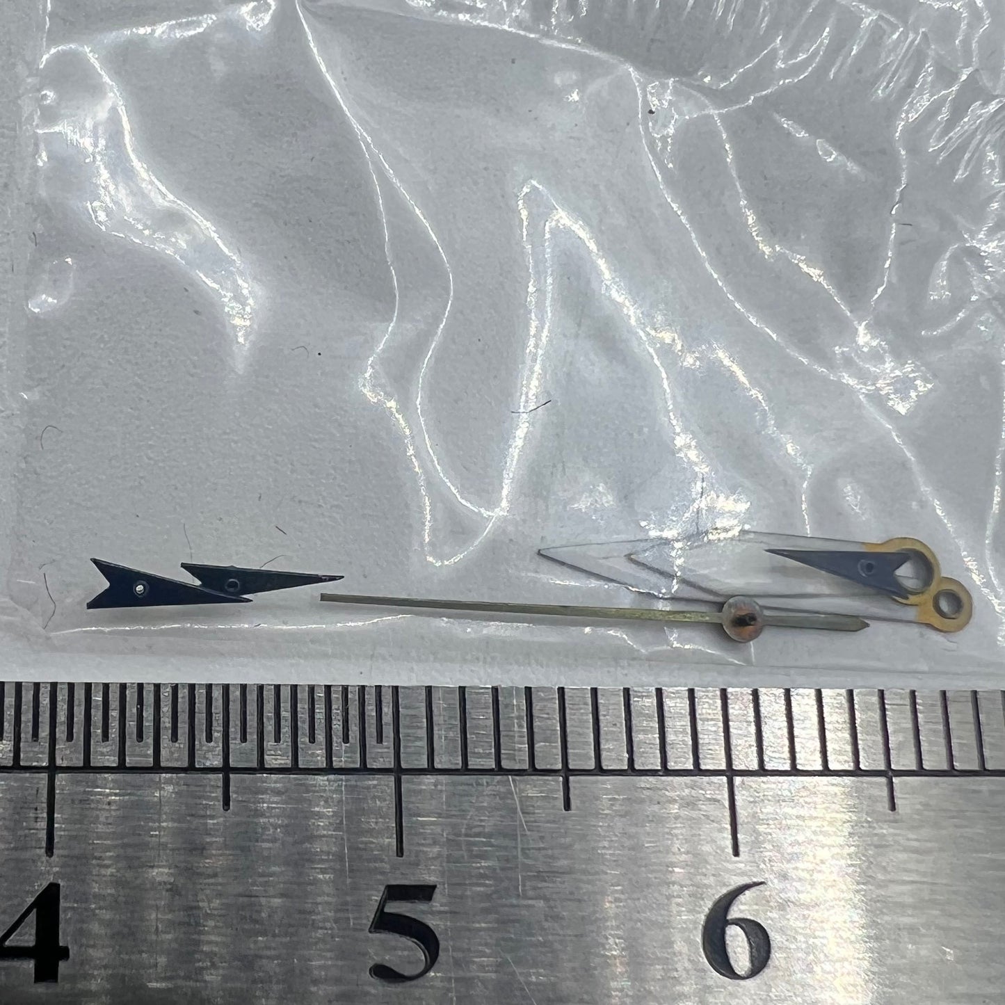 Dark blue arrow-shaped 13mm watch hands for Miyota OS series, precise and stylish time display.