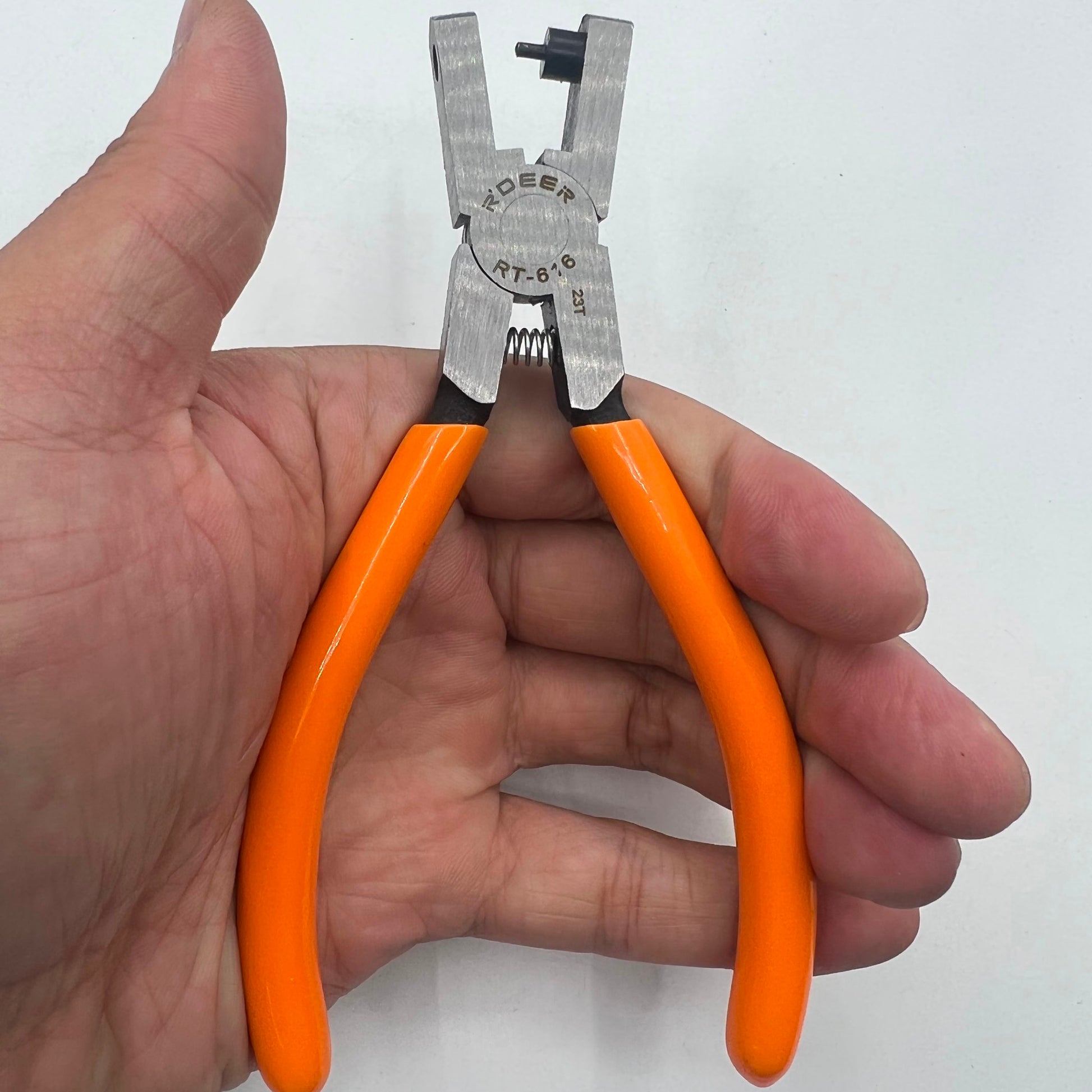 RT616 Punch Pliers for precise 2mm holes in watch belt tag tape, ideal for watch repair tasks.