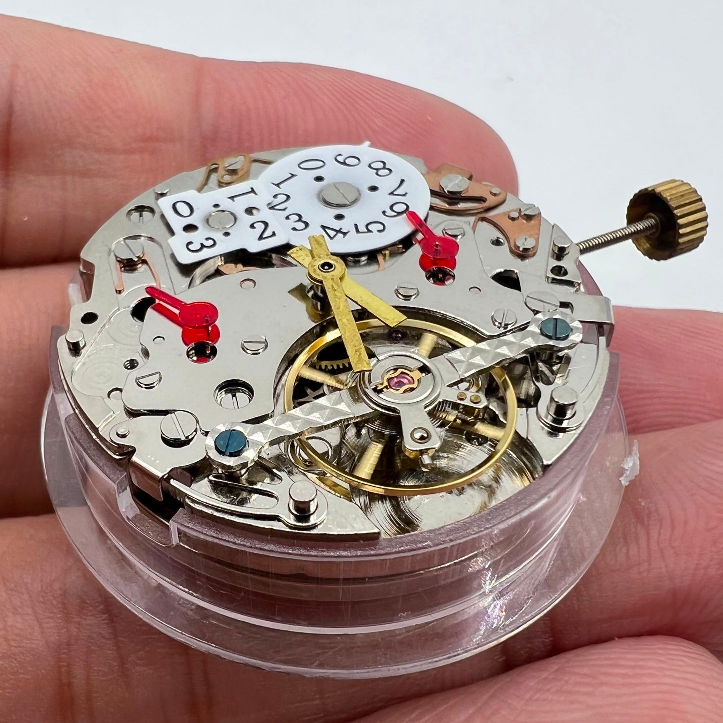 Automatisches multifunktionales mechanisches Uhrwerk, Datumsanzeige bei 12, blankes Rad bei 6