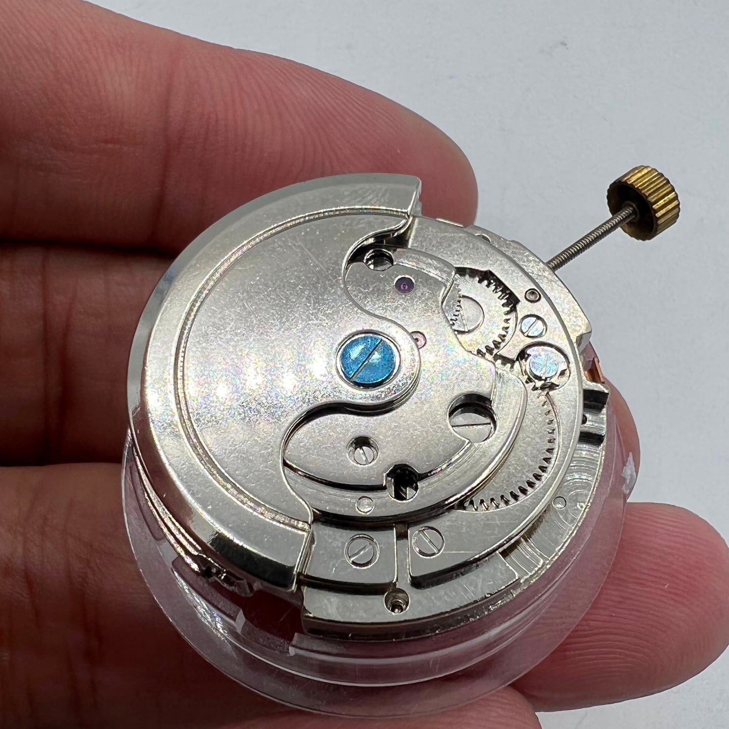 Automatisches multifunktionales mechanisches Uhrwerk, Datumsanzeige bei 12, blankes Rad bei 6