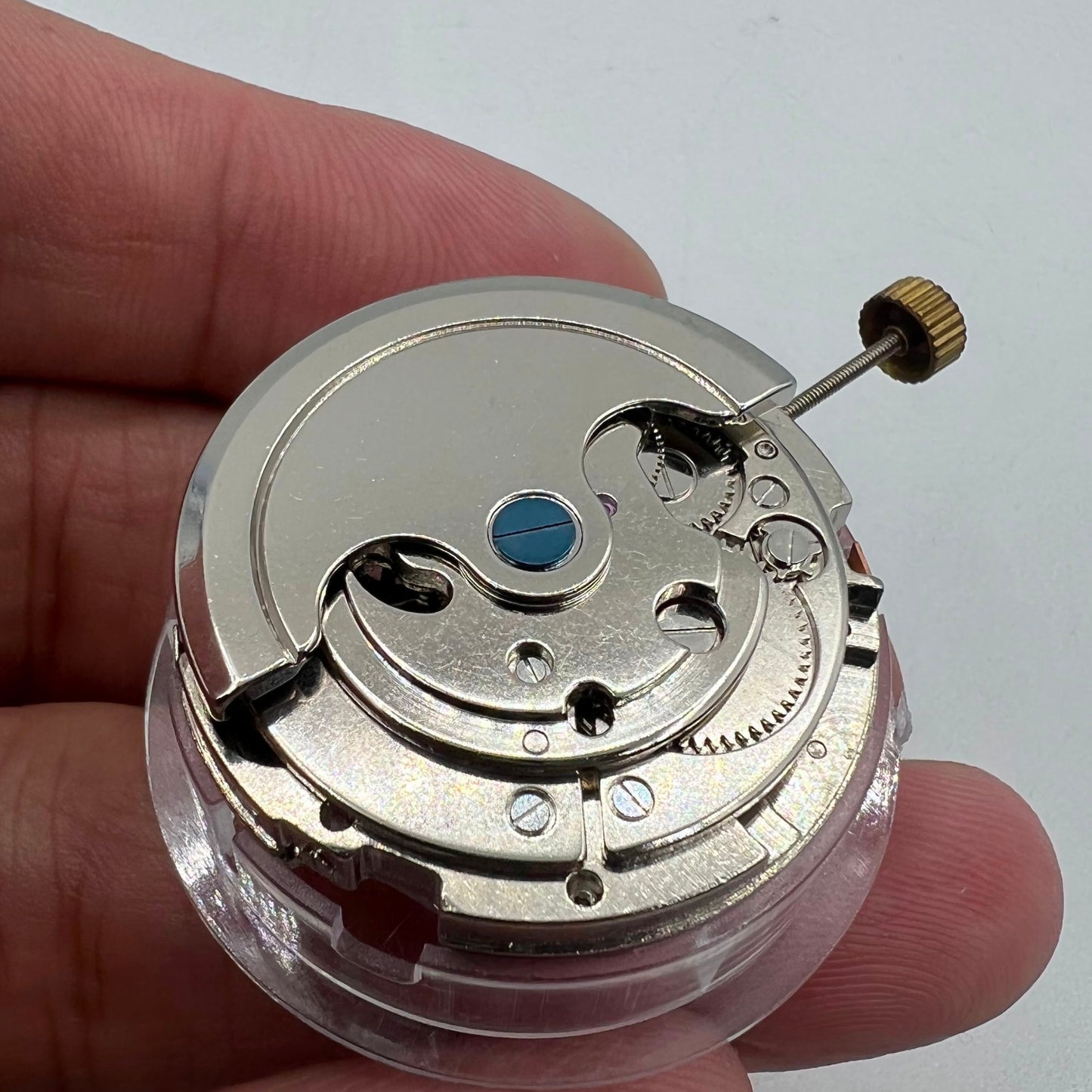 Automatisches multifunktionales mechanisches Uhrwerk, Datumsanzeige bei 12, blankes Rad bei 6