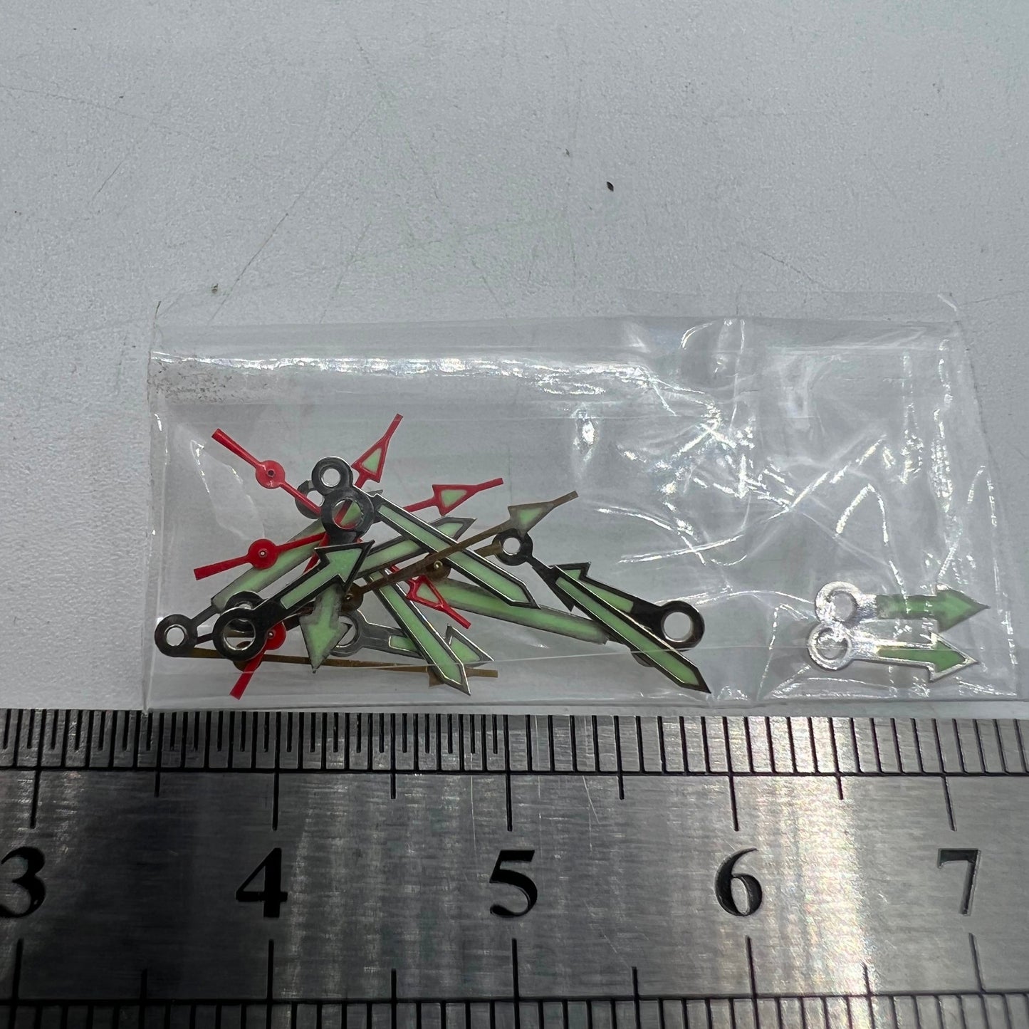 Arrow-shaped green luminous watch hands set for Miyota 2035, 2115, 2105, 2305 movements.