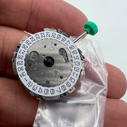 Japan-made Miyota FS01 quartz movement watch part for precise timekeeping in watch repairs.