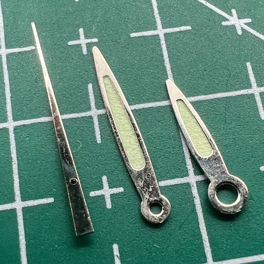 Arrow-shaped green luminous watch hands set for Miyota 2035, enhancing readability and style.