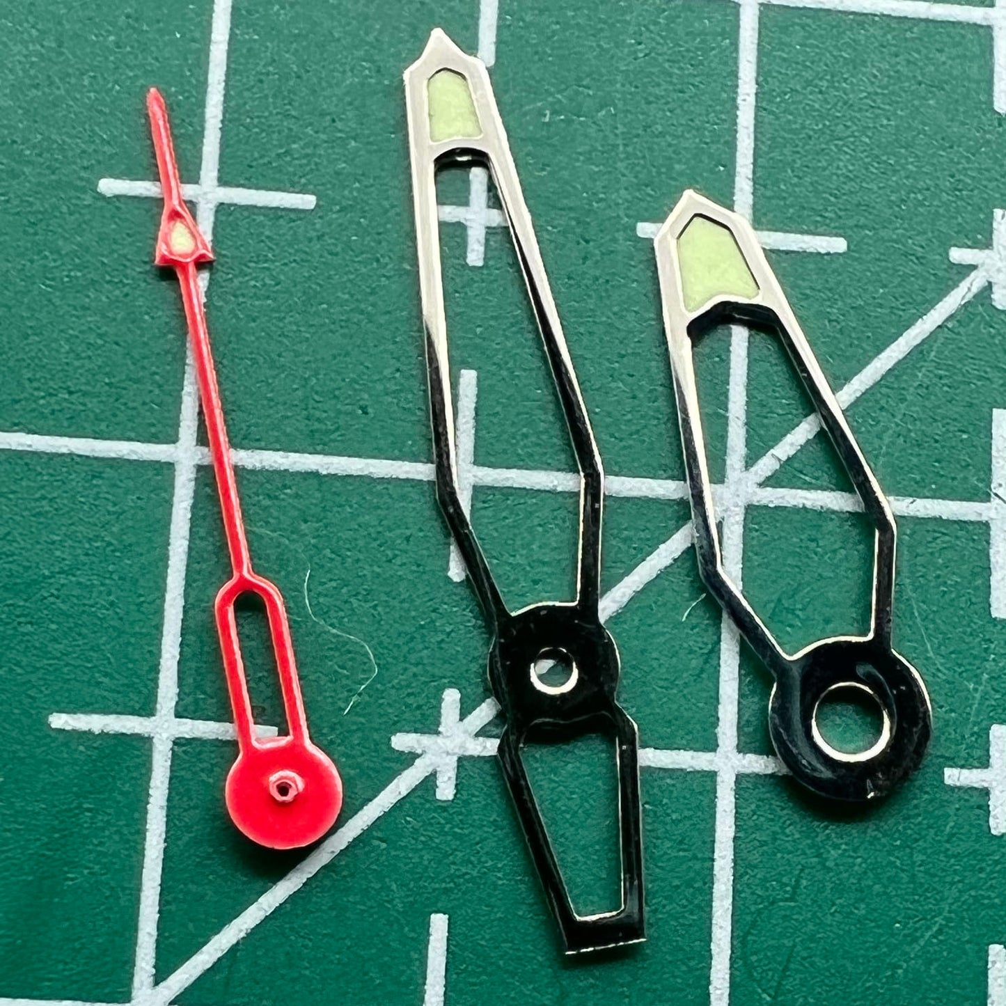 Green luminous hollow watch hands set for Miyota 2035 and 2115 movements, ideal for DIY repairs.