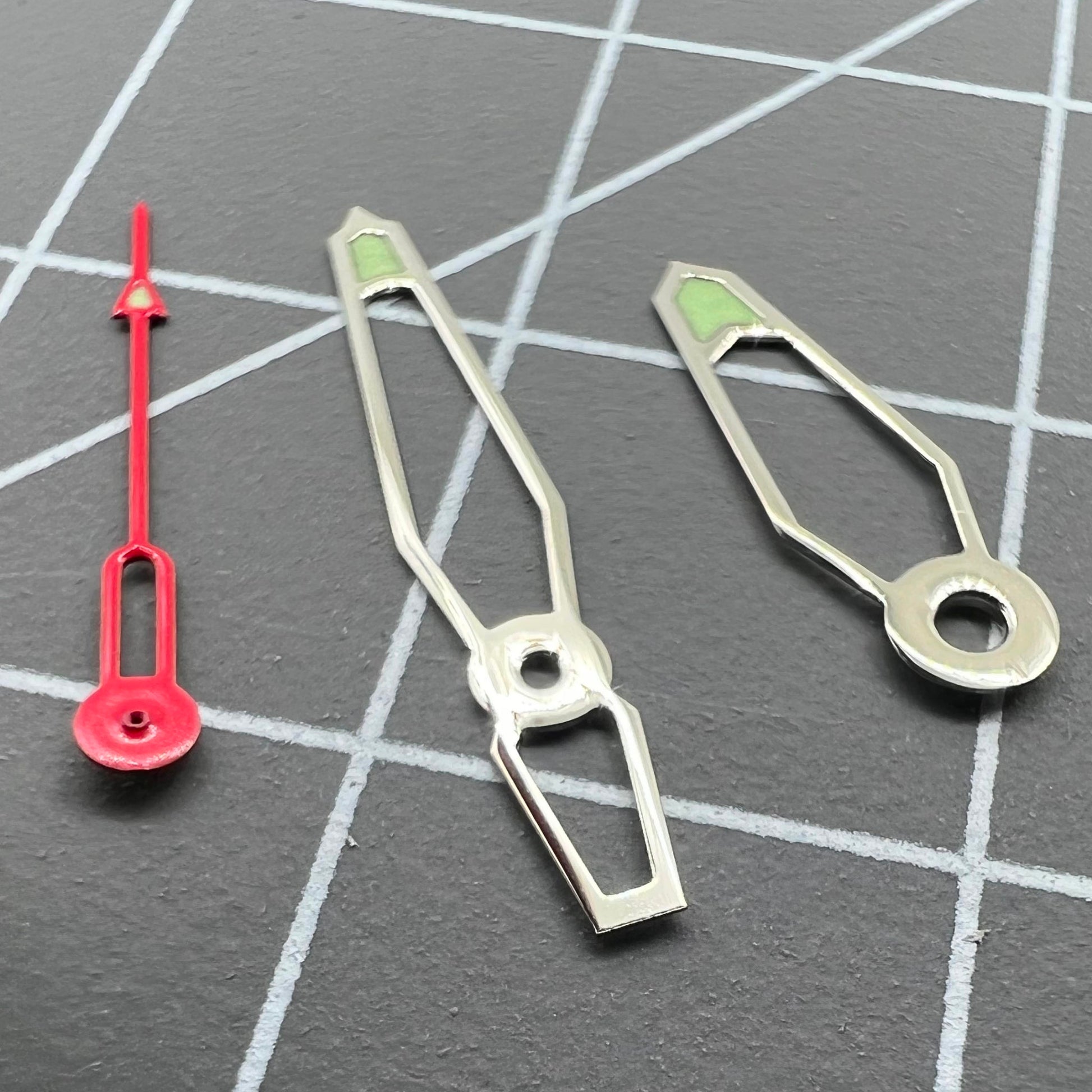 Hollow green luminous watch hands set for Miyota 2035, 2115, 2105, 2305 movements, enhancing readability in low light.