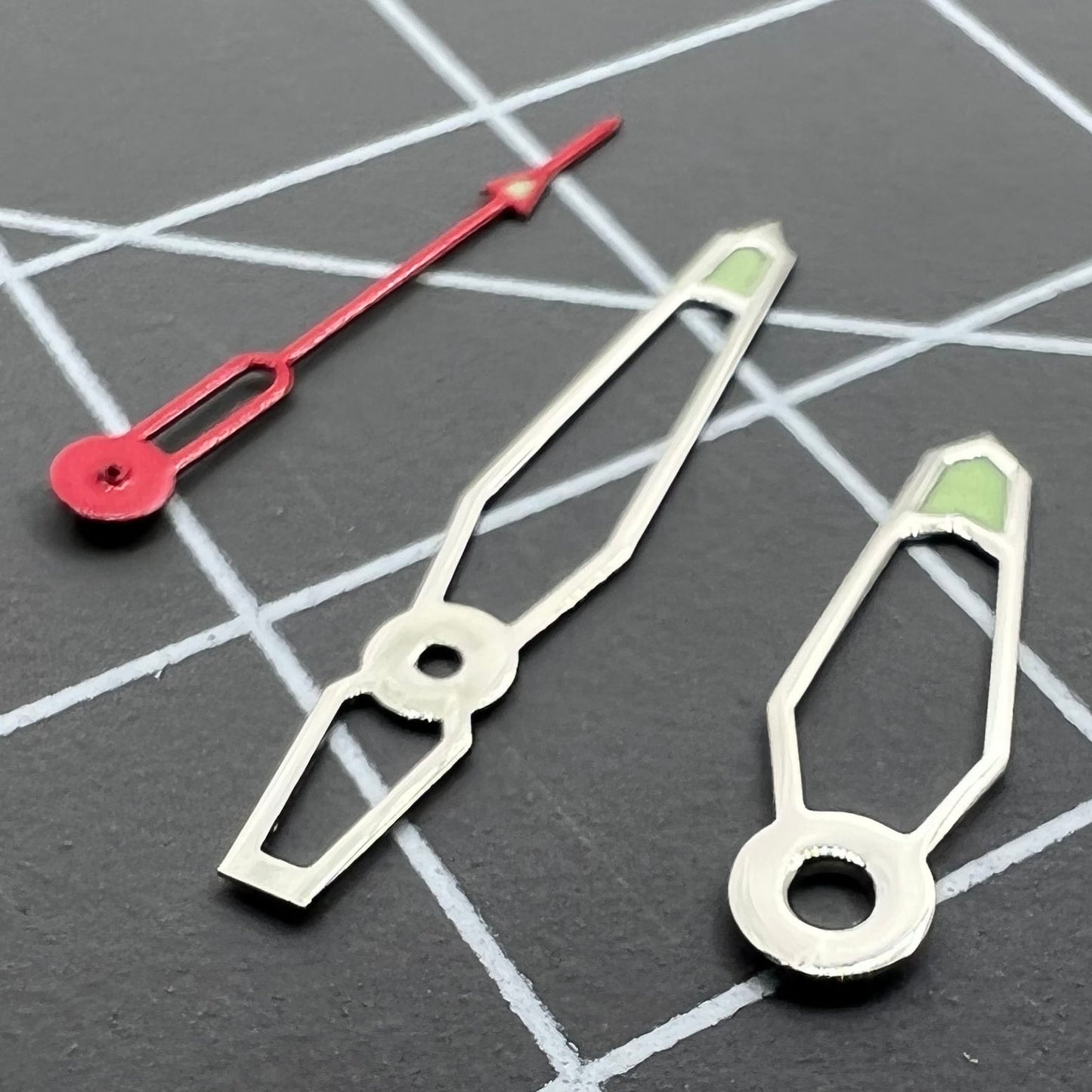 Hollow green luminous watch hands set compatible with Miyota 2035, 2115, 2105, 2305 movements for easy time reading in the dark.