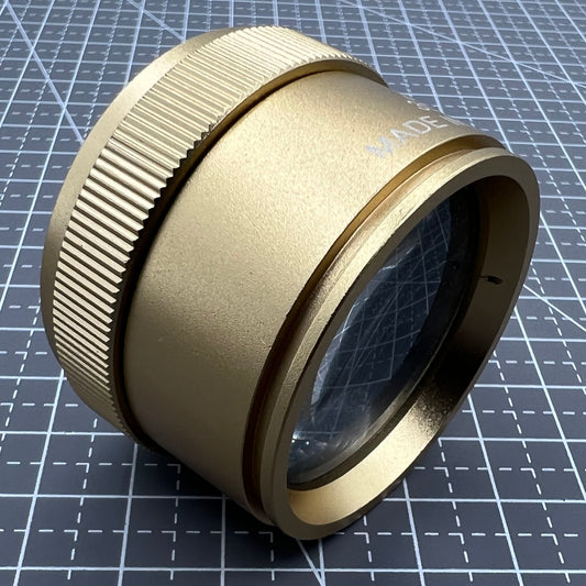 Germany-made bright golden 30X magnifier loupe, ideal for precise watch repair and jewelry inspection.