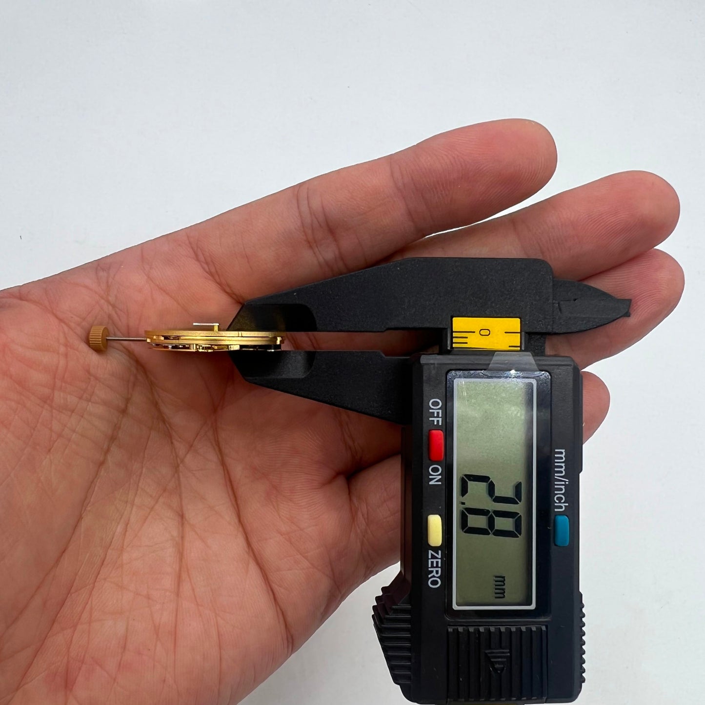Swiss Made Ronda 6004B gold gilted quartz movement for accurate watch accessory repairs and upgrades.
