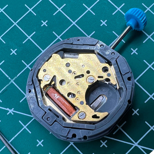 Miyota 6M12 quartz movement with date at 3 o'clock, 3-hand design, Japan made, ideal for watch repairs.